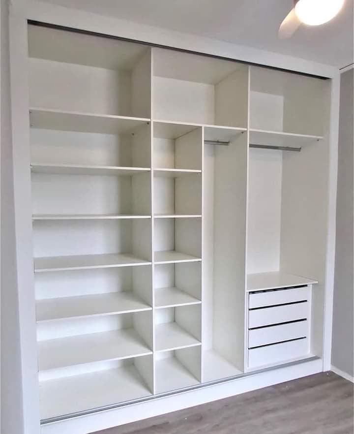 White built-in walk-in wardrobe with open shelving